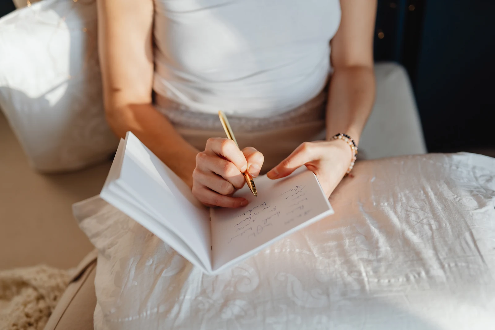 Woman writing in a gratitude journal, the first practice that rebuilt confidence during perimenopause